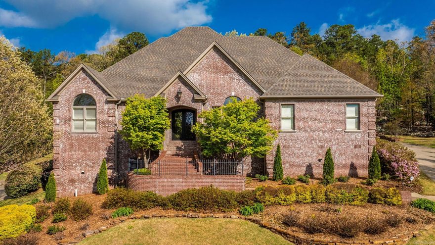 Custom-built home in the desirable LaMarche Place community of Chenal with numerous updates and exceptional amenities. New roof in 2024, fresh interior paint in 2026, main HVAC replaced in 2023, upstairs HVAC replaced in 2018, and quartz countertops added in the primary bath and hall bath in 2026. Kitchen, other baths, and upstairs kitchenette feature granite countertops. Spacious upstairs in-law suite offers private laundry, kitchenette, and dishwasher. Whole-house generator and tankless water heater. Hardwood floors downstairs in living areas, tile in 2 baths, travertine in primary bath, and carpet in bedrooms. Professionally landscaped with a large stamped concrete patio backing to peaceful green space. Stairlift conveys or can be removed.