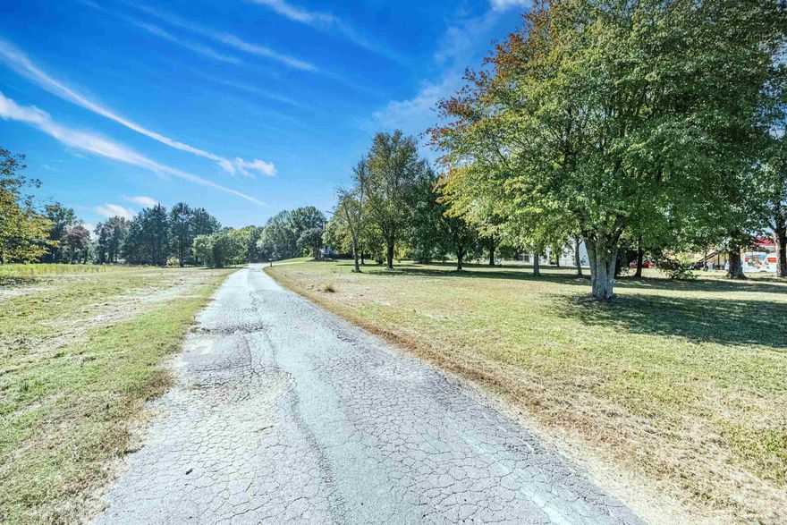 2474 sq home on 4.3 acres.  The home sets in the middle of the 4.3 acres.  There is also a detached storage building.  This property has the potential to be rezoned for commercial use.  this makes it an excelant investment.