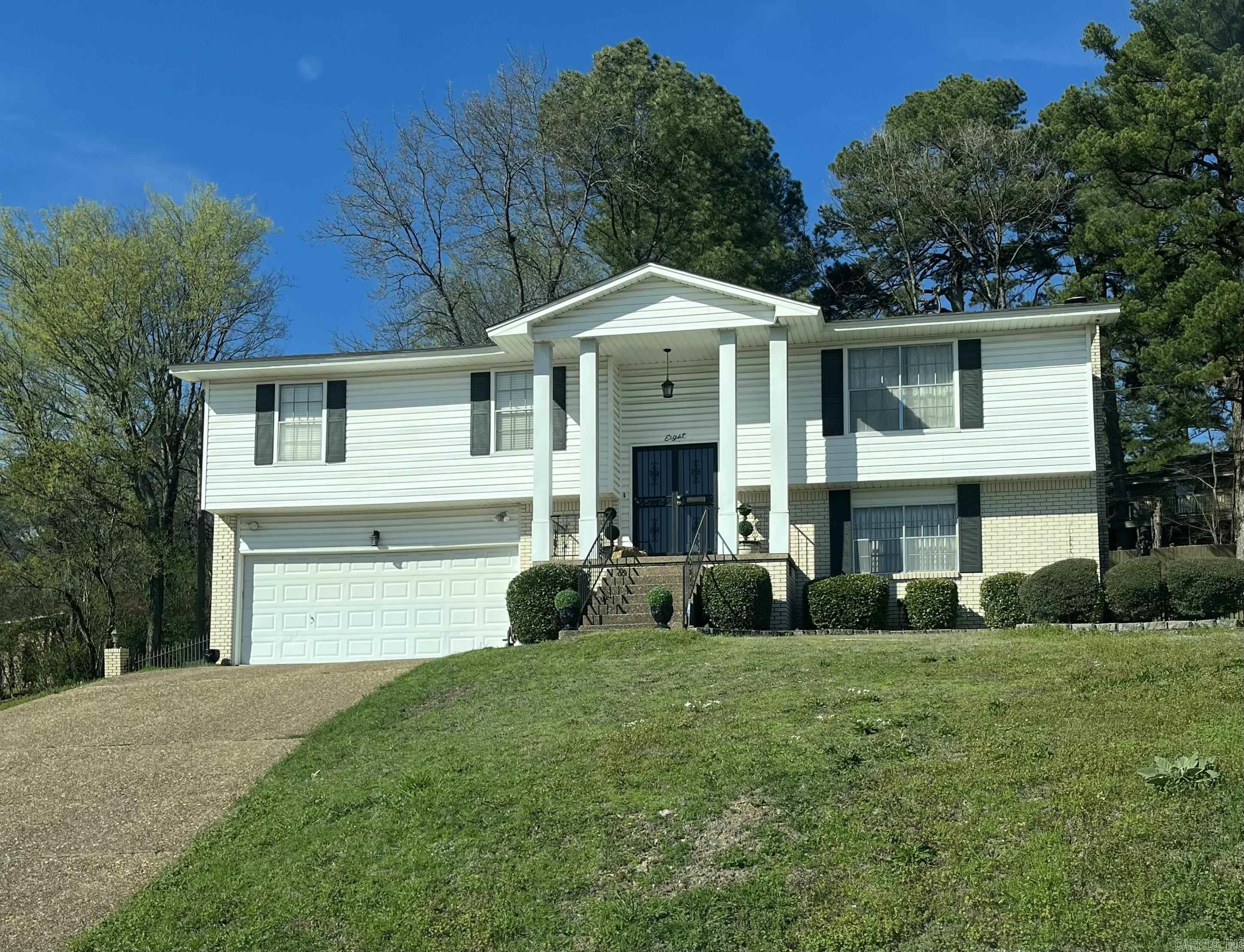 This spacious 3Bed, 2 1/2 Bath, 2 car garage, split level home in the University Park Historical District of Little Rock is waiting for you. This beauty is nestled on a hill, in a cul-d-sac and has amazing curb appeal. All that's missing is you.
