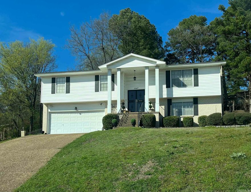This spacious 3Bed, 2 1/2 Bath, 2 car garage, split level home in the University Park Historical District of Little Rock is waiting for you.  This beauty is nestled on a hill, in a cul-d-sac and has amazing curb appeal.  All that's missing is you.