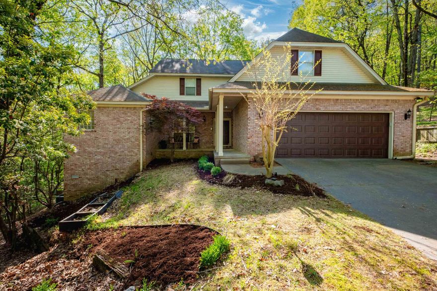 Nestled at the end of a quiet cul-de-sac, this secluded family home sits on a spacious ¾-acre lot in the Hillsborough neighborhood. Beautiful hardwood floors flow throughout the main level, enhancing the warmth & elegance of the space. The stunning two-story living room features a wood-burning fireplace & seamlessly opens to the kitchen—perfect for entertaining. The kitchen is equipped with a gas cooktop, stainless steel appliances, granite countertops, & a walk-in pantry for ample storage. Enjoy meals in the separate formal dining room, ideal for gatherings. The main level also boasts a primary bedroom suite for ultimate convenience. A half bath, large laundry room & plentiful storage throughout add to the home's functionality. Upstairs, you’ll find three generously sized bedrooms, a full bathroom, & a versatile bonus room, perfect for a home office, hobby space, or guest area. The walk-out basement offers an additional 400 square feet of flexible space—not included in the total square footage—ideal for a gym or workshop.  Step outside to the screened-in porch overlooking a private, wooded backyard—perfect for outdoor entertaining or relaxing evenings. Agents, please see remarks.