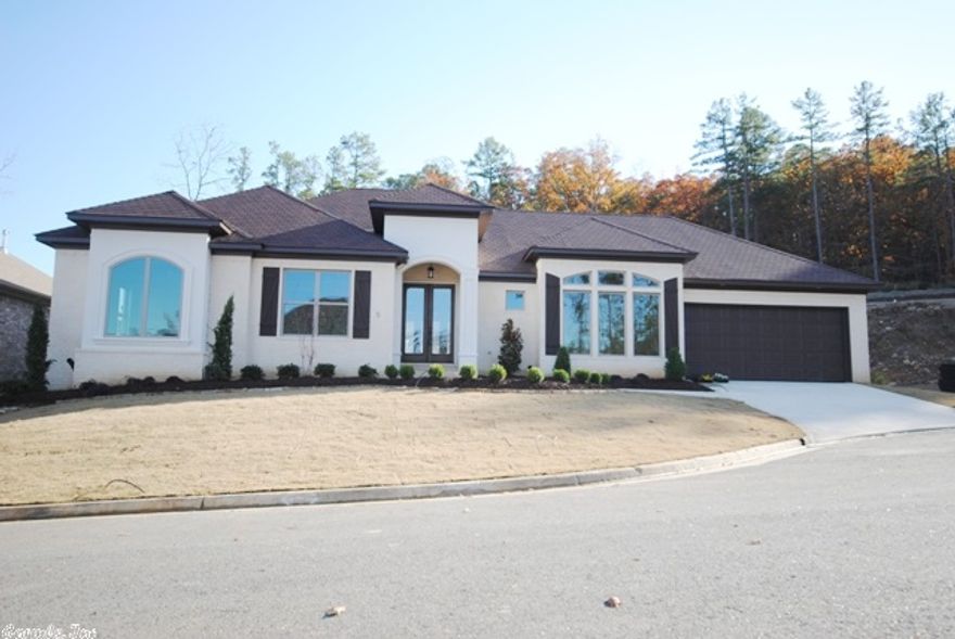 Fabulous New One Level in Hickory Grove.  This open floor plan is the perfect layout for entertaining or comfortable casual living.  The great room features 12’ ceilings w/fireplace and overlooks the walled in backyard.  The oversized kitchen is just off the great room and formal dining room and features high end appliances and has an informal dining area.  The huge master suite features a tray ceiling and beautiful bath with walk in closet.  Two additional guest rooms have easy access to a full bath.