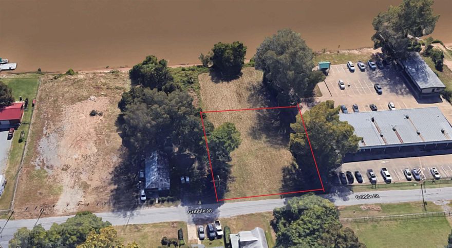 RIVERFRONT LAND! Half acre of flat, developable land fronting the Arkansas River.  Great view and easy street access.