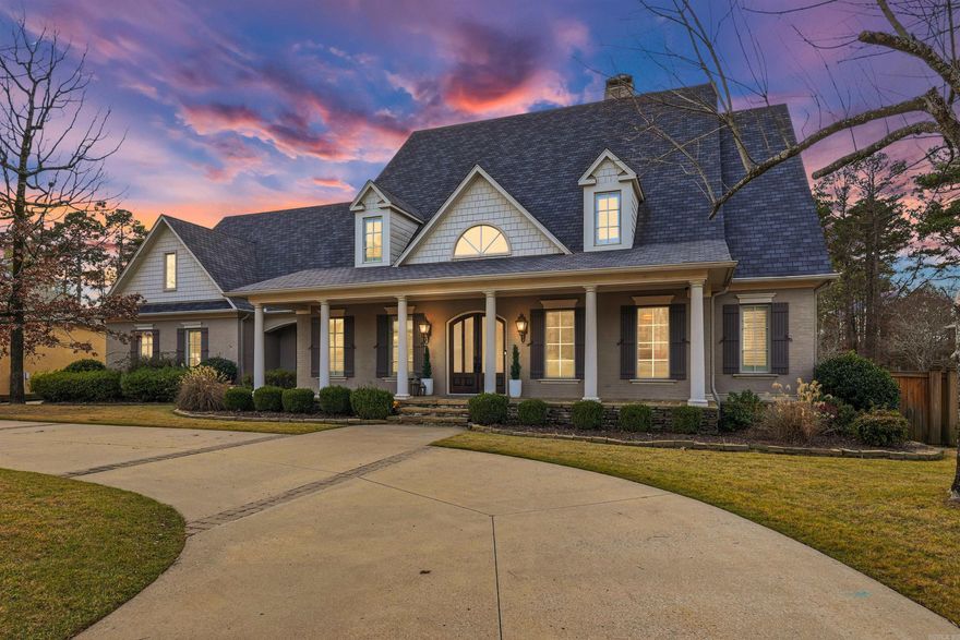 Behind the private gates of Germay Court, this Kevin Hughes custom home is positioned on the 5th fairway of the Bear Den Golf Course, offering an oversized lot and cart-path access to Chenal Country Club. A charming front porch welcomes you inside to the foyer that is anchored by an office w/ oak-stained woodwork & built-ins and a formal dining room w/ a nearby wet bar. The great room features a gas fireplace with Italian marble mantle, built-ins & access to the covered back porch. The remodeled gourmet kitchen includes fresh updates and premium appliances, making it a chef’s delight. Additional main-level features include a breakfast area, pool bath, half bath, pantry w/ coffee bar, laundry room & mudroom. The main-level primary suite is a peaceful retreat & includes an ensuite bath with dual vanities, a jetted tub, walk-in shower, water closet & walk-in closets. Upstairs offers a game room w/ kitchenette, hangout room, guest suite with private bath & 2 additional bedrooms that share a hall bath. The backyard is designed for entertaining with covered & open patios and a renovated gunite pool & spa. A three-car garage, workshop, and circle drive complete this exceptional property.