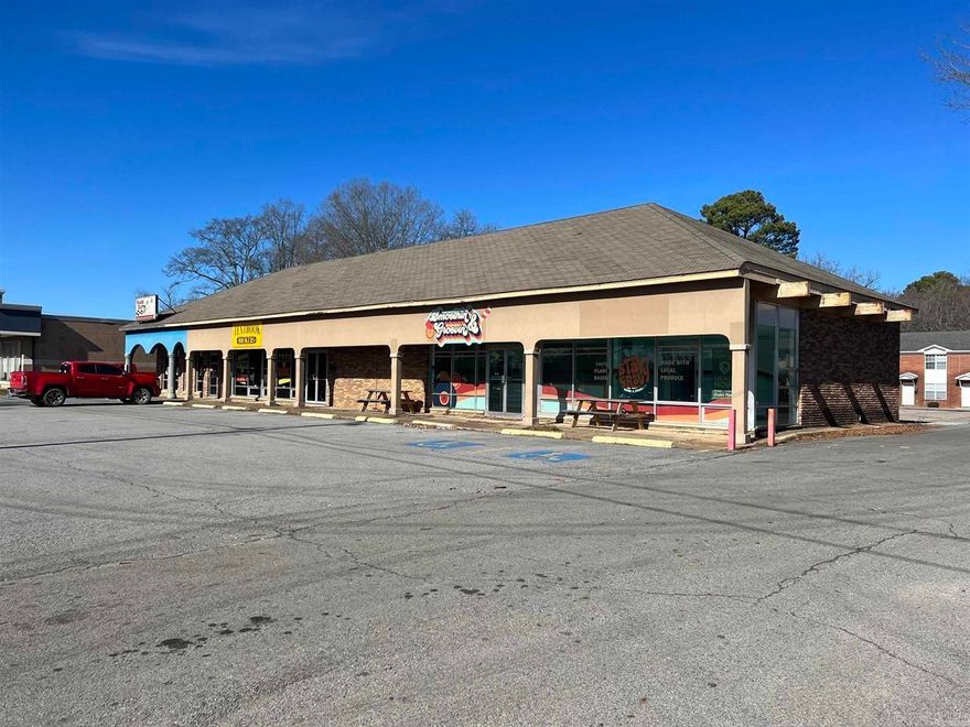 Unlock the potential of this 1,760 sq ft commercial lease property, ideally located across from Harding University in the heart of Searcy, Arkansas! Previously home to the popular "Smoothin' Groovin' Drink Shop," this space is a fantastic opportunity for restaurateurs or business owners looking to tap into the high-traffic flow of students, faculty, and locals. With its prime location, the property offers maximum visibility and easy accessibility, ensuring steady foot traffic throughout the day. The space is already equipped for restaurant use, making it a seamless transition for a new culinary venture or beverage-focused business. The vibrant and youthful energy surrounding Harding University creates a perfect environment for dining spots, cafes, or quick-service concepts. This highly desirable location offers a rare opportunity to establish your business in a bustling, college-town atmosphere with a ready-made customer base. The potential for success is amplified by the proximity to the university, ensuring constant demand from a steady stream of students, staff, and visitors. Don't miss out on the chance to lease this prime commercial space and bring your restaurant concept.