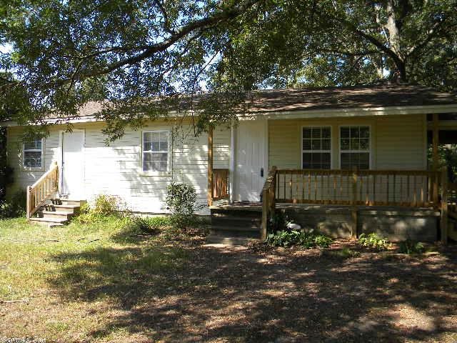 ARE YOU LOOKING FOR COUNTRY LIVING COME TAKE A LOOK AT THIS NICELY UPDATED HOME ON 1.22 =/- ACRES. 3 BEDROOMS, 2 BATHS. BEAUTIFUL WOOD FLOORING IN THE LIVING ROOM. ROOF REPLACED IN 2009, TANKLESS HOT WATER TANK, NEW HEAT PUMP IN 2006. KITCHEN OPEN TO THE LIVING ROOM. PLEASE MEASURE FOR SQ FT ACCUARCY