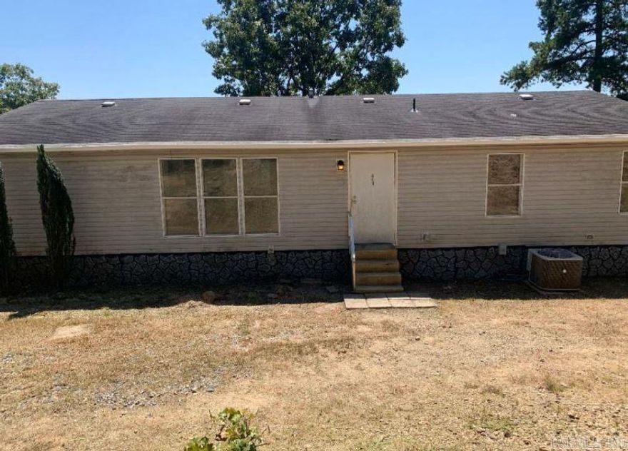 Investment opportunity available this home offers 3 bedrooms, 2 baths and situated on approximately 1.6 acres. Needs work to make move in ready. CASH ONLY OFFERS,  SOLD AS IS, buyer responsible to ensure this Mobile Home/Manufactured Housing Unit has had the wheels, axles, and towing hitch removed, is on a permanent foundation or piers, and has been deemed permanently affixed to the subject property and a real property improvement, according to the requirements set forth by the Parish / County or Jurisdiction the subject property is located in, and obtain the vehicular title to the Mobile Home.  Buyer to sign Hold Harmless and close AS IS. Buyer to complete due diligence prior to offer, sold as is no inspection contingency
