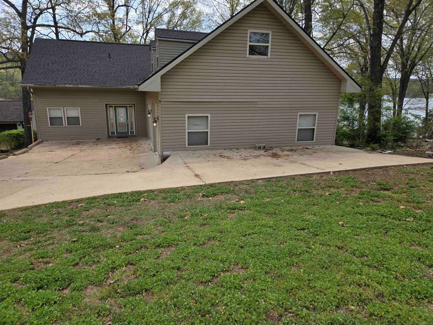 Cannot be Shown Until after Friday April 10th Beautiful 3BR/3 bath home on Lake Thunderbird! 3 car garage/shop with extra parking. Each level has 1 bdr and 1 bath room. Prime location on Lake Thunderbird, on quiet cul de sac. Interior photos coming soon.