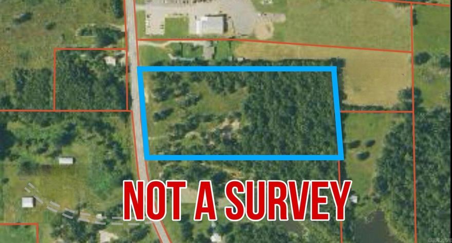 Prime opportunity with this 8.46-acre tract conveniently located on the highway just minutes from town. This versatile property offers excellent access and visibility, making it ideal for residential, recreational, or potential commercial use. The land is level and easy to work with, featuring a great mix of open and wooded areas--approximately half cleared and half timber, providing both usability and privacy. With no restrictions, you have the freedom to develop or use the property to fit your needs. Utilities are readily available, including access to rural water and electricity, adding to the property's convenience and value. Whether you're looking to build your dream home, start a business, or invest in land with strong potential, this property checks all the boxes.