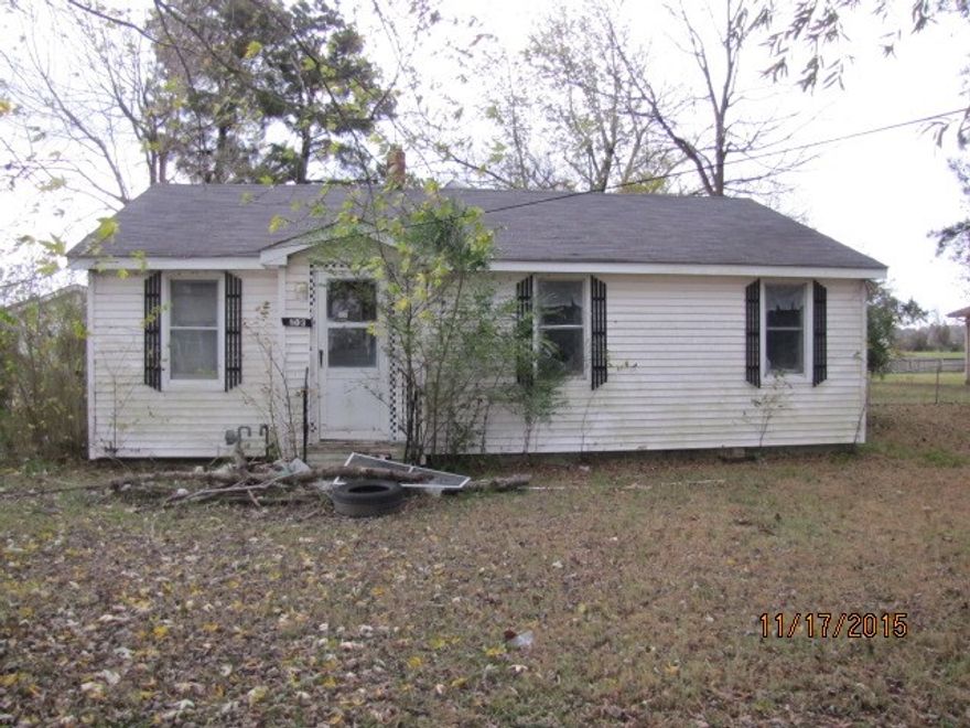 R2 zoned lot on Reynolds Rd located close to shopping and schools. 65 ft. road frontage and 528 ft deep (0.79ac) under current city code allows duplex to be built without requesting a variance. PLWC supplies water and electric to lot. Natural gas and city sewer on lot. Small frame house on lot is considered of no value--price is for the potential of the lot. House will not qualify for a mortgage. ARCountydata scan is located in Associated Documents.