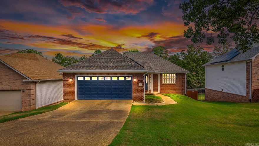 Welcome to this beautifully renovated home in the heart of Maumelle! This 3-bedroom, 2-bath charmer showcases a spacious split floor plan with fresh paint, new floors, stylish finishes, and paid-off solar panels to keep your utility bills low in this modern retreat. The living room offers vaulted ceilings and a cozy fireplace—perfect for relaxing or entertaining. The kitchen highlights walnut butcher block counters, stainless appliances, and a breakfast bar that flows into the dining area. The primary suite features a walk-in closet, double vanity, and a separate tub and shower. Step outside to a fully fenced backyard with a patio—great for pets, kids, or backyard BBQs. Ideally located minutes from Maumelle Blvd, shopping, dining, parks, and schools, this home blends comfort, convenience, and charm. Don’t miss your chance to own this move-in ready beauty in one of Maumelle’s most established neighborhoods! Schedule your showing today