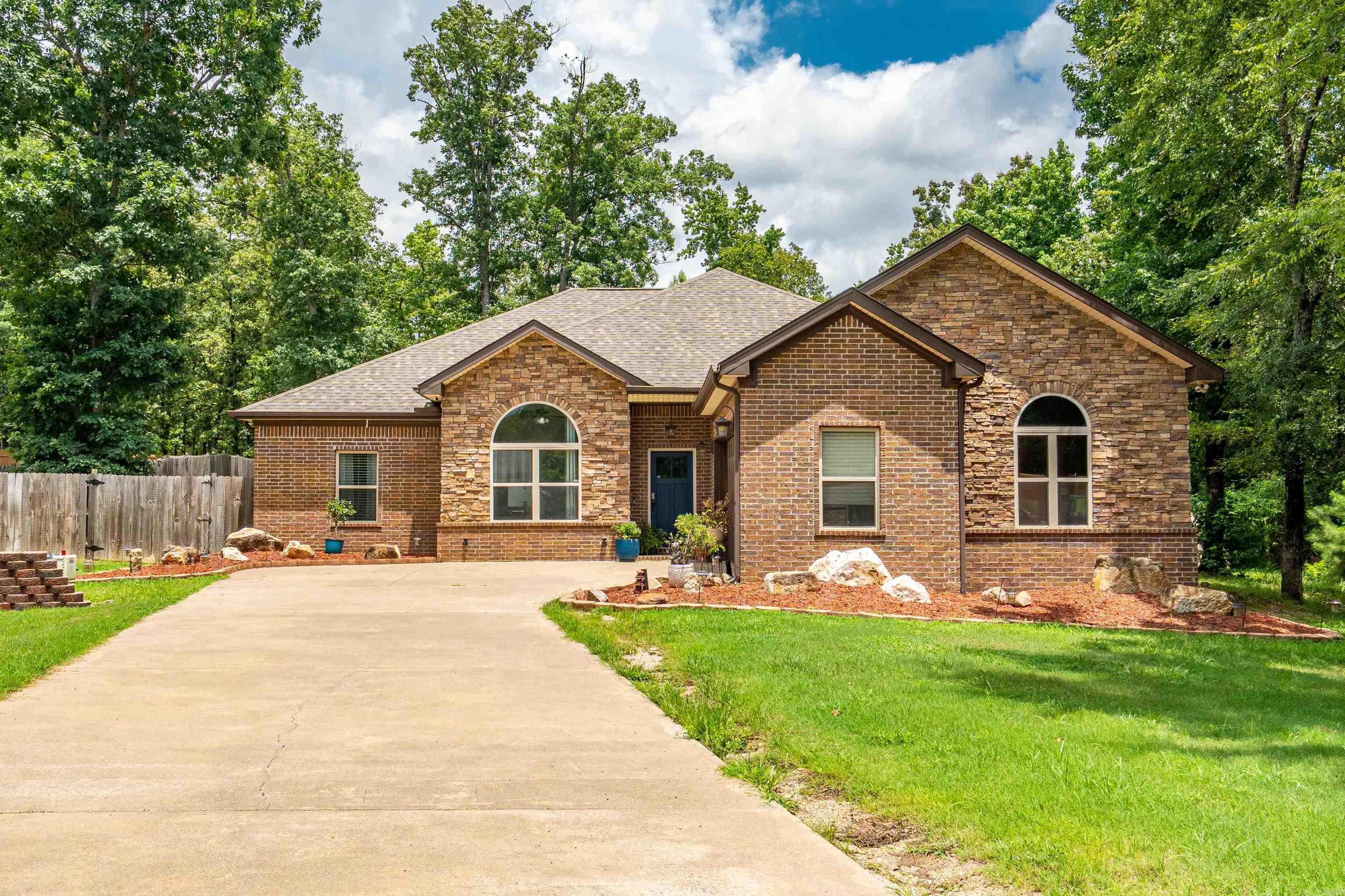 Stylish and inviting, this 3-bed, 2.5-bath home sits on 1.34± acres in the sought-after Lake Hamilton School District. A dedicated home office easily converts to a 4th bedroom.The living room features striking vaulted wood ceilings, and the spacious primary suite offers a walk-in closet, double vanities, jetted tub, and a large walk-in shower. Enjoy the fenced backyard with a covered patio and fire pitāperfect for entertaining or relaxing. This property blends comfort, space, and outdoor livingāschedule your showing today!
