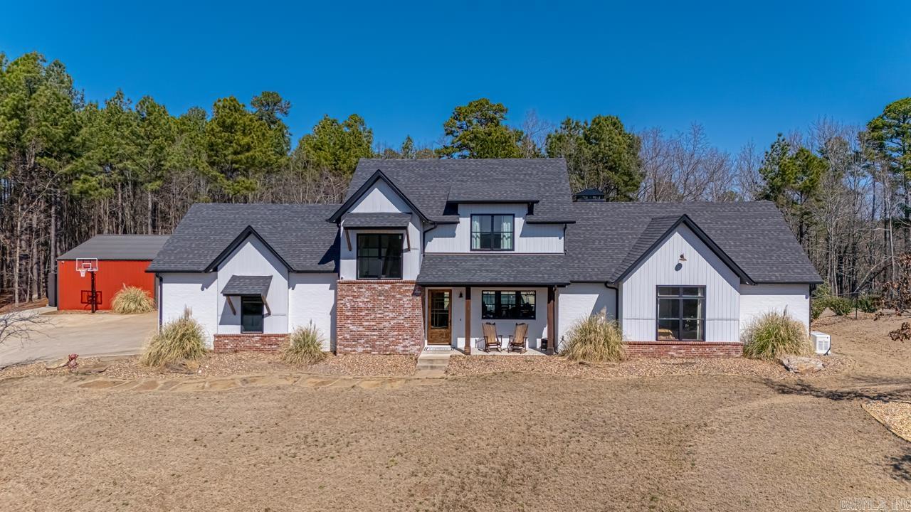 This home offers an open concept floor plan, vaulted ceilings, finished concrete floors and tons of natural light! Stone fireplace in great room w/large hearth w/Quadra-fire insert w/blowers. Open kitchen w/48" Gas range w/double oven & pot filler, Ice maker in kitchen island. A spacious primary bedroom w/vaulted ceilings & natural light, Large Master bath w/Free-standing master tub, a shower w/ double shower heads, master closet w/sectioned sides for his/her each w/built-in dresser! 3 beds upstairs w/oversized closets & large bathroom w/double sinks & laundry chute. Whole house 20KW Generac generator supplied by 500 gallon owned propane tank, Whole house foam insulated w/in-line dehumidifier, Ample floored attic space for storage, Gas tankless hot water heater, oversized 2 car garage. 20ft door, Gas bib for future outdoor kitchen or free-standing grill, Approx 1 acre fenced w/addl fenced area for chickens/dog run 18' x 42' x 10' L-shaped heated liner pool (8' depth) 30' x 60' Shop that includes 30' x 20' finished space w/bar area w/sink &Ā ice maker, full bathroom & closet, 12'x8' garage door w/glass panels. Shop has 15' x 40' covered porch / addl 10' x 40' covered storage area