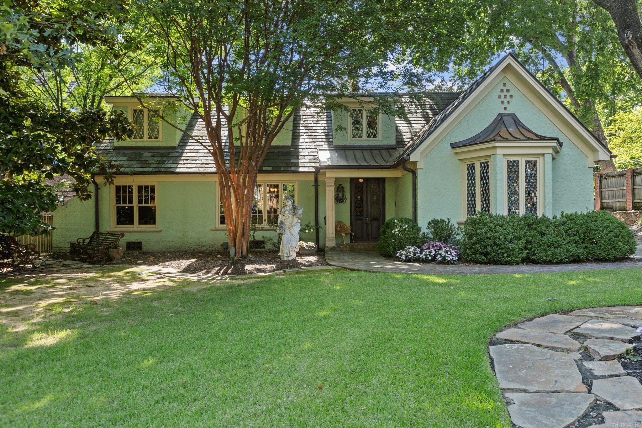 EXQUISITE!  Walk to the Little Rock Country Club!  This custom home was taken down to the studs and rebuilt in 2004 - 2006. This 5 or 6 bedroom home offers a formal entry,  formal living room with beam high ceilings, formal dining room, front salon with private bath (could be 6th bedroom), custom eat in kitchen with 3 dishwashers, paneled sub zero and separate refrigerator drawers and frozen ice maker,  family room with built ins and fireplace, the primary suite and bath is unbelievable and is located on main level with motorized drop down t.v. and remote control window treatments, beautiful formal study with built ins, separate office nicely tucked away, in house little girls play house (can be converted), another bedroom with bath located on the main level, 3 bedrooms with 2 full baths located on the second floor, game room and sitting area and a bonus / exercise room. Beautiful covered back porch with custom lighting and side loading carport and room for your golf cart.  Custom laundry room with 2 W and D.  A document is available listing all the extensive custom details.  AGENTS SEE CONFIDENTIAL REMARKS: