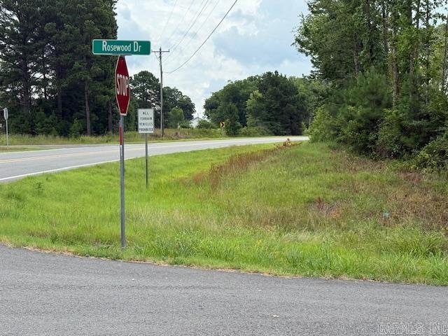 Approximately 65 acres of undeveloped land in an excellent location along Hwy 31 north of Beebe. Partially cleared. There are 2 ponds located in the middle of the property. Paved road on 3 sides. Call for an appointment. Zoned Residential.