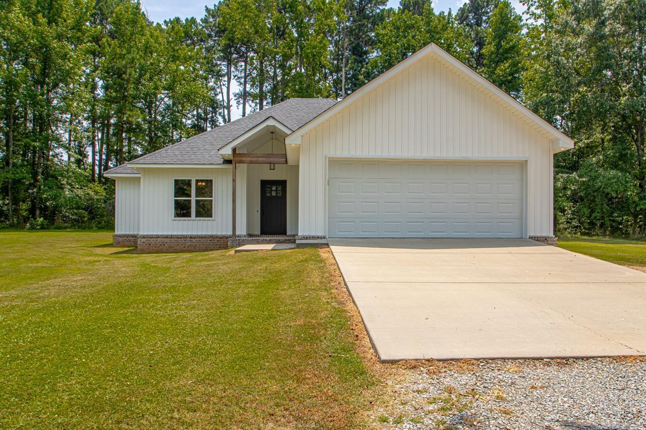 Charming home in the East End Community. This newer built home features 3 bedrooms 2 full bathrooms on approx. 1 acre. The kitchen has a large island with grantie counter tops and stainless steel appliances. The Kithen and dining are both open to the living room. The split bedroom plan is great to add privacy for the primary suite. The primary suite bathroom has a custom tiled shower with large walk in closet. You will be able to watch the deer from your back porch. There is a carport for storage, boat, vehicle, etc. Part of backyard is fenced. This one will not last long.