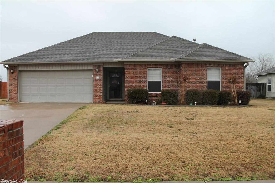 Beautiful home in a quiet neighborhood! This home has had many updates, and it was just built in 2006! Gorgeous wood floors! New guttering. Tray ceilings! HUGE back yard-perfect for entertaining your friends and family! This home is GREAT for a small family or first time home buyers! 2 car garage with quiet door opening. Sq. Ft. approx. measuring encouraged.  See Agent Remarks!