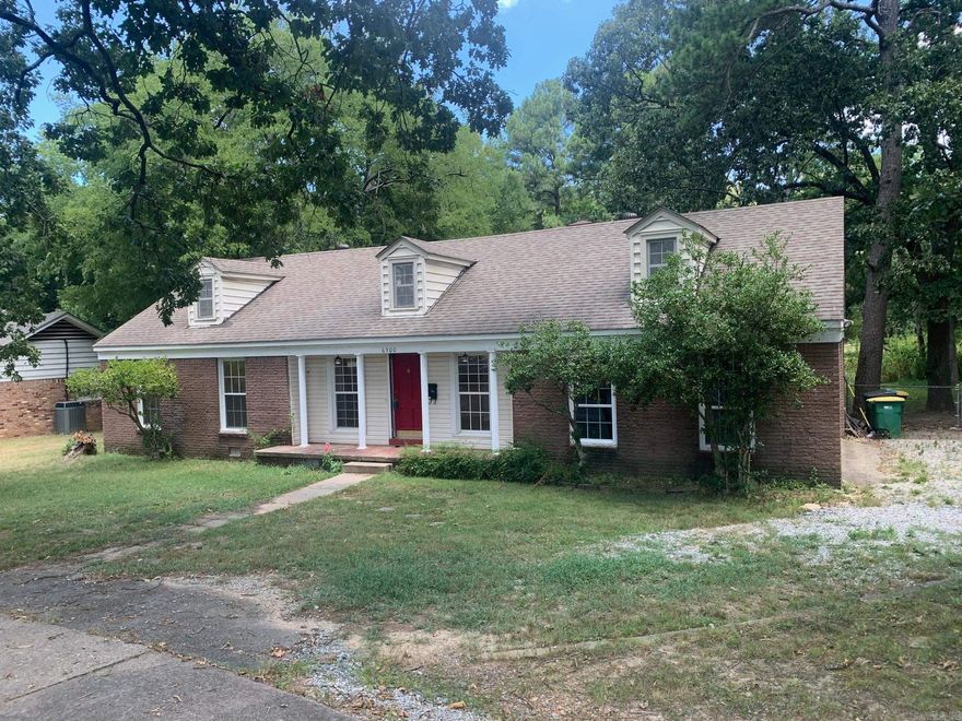 Centrally located charming traditional style home with circle drive. Living Rm, Eat-in-kitchen. The Den can also serve as a Formal Dining Rm, which also has a large window and site built FP. Relax on your Patio surrounded by large trees and full chain fenced spacious back yard. Just minutes from hospital, shopping, school and park. It's a cozy house that is waiting to become your home.