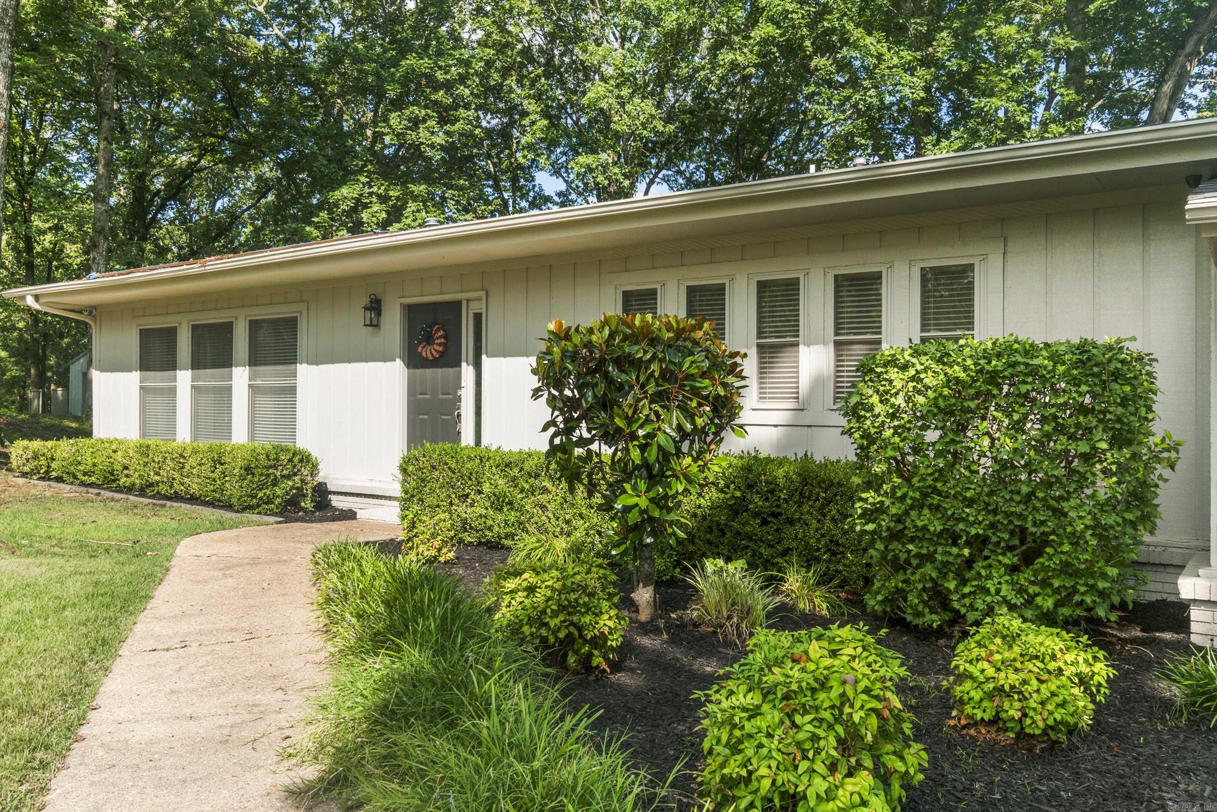 Large Lot! Spacious Floorplan! Private Cove! This updated modern home on Briarcliff Circle in Wynne sits atop Crowley's Ridge on a large lot in a quiet coveāoffering the perfect blend of space, comfort, and charm. The unique split-level floorplan features multiple living areas ideal for flexible family living. The main level boasts vaulted ceilings, a stunning gas log fireplace, and a fully remodeled kitchen with quartz countertops, island seating, and sleek finishes. Upstairs, the spacious primary suite includes a private balcony and large bath with double floating vanities. Also on this level, two guest bedrooms, a full bath, and ample storage spaces. Downstairs, enjoy a rare oversized bonus room, powder room, laundry, a great tornado safe space, and even more storageāopening to a huge deck and expansive backyard with nice views. Major updates in recent years include new roof, windows, flooring, paint, kitchen, baths, and fixtures throughout. A two-car garage and exterior storage add to the functionality. Move-in ready and made to impressādonāt miss this hidden gem! A great value and in an excellent location! Call or TEXT us TODAY!