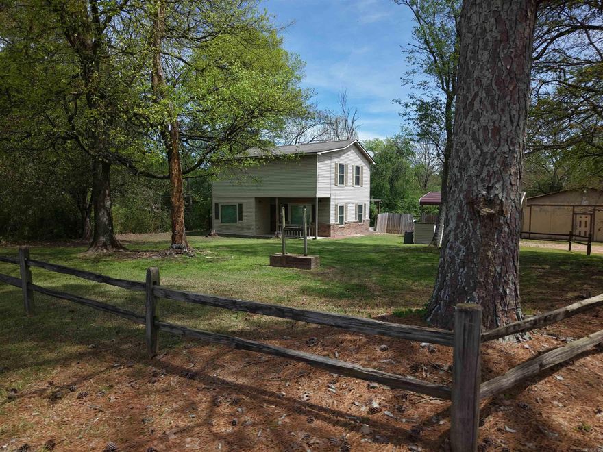 Charming 2-bedroom, 1.5-bath, two-story home in Newhope offering space, functionality, and convenience. Both bedrooms and the full bath are located upstairs, along with two large closets, while the rest of the home is conveniently situated downstairs. The oversized primary bedroom—formerly two rooms—provides plenty of comfort and flexibility.  Enjoy a spacious laundry area with extra storage and a kitchen/dining combo featuring a pantry with plenty of room for storage and a deep freezer. The home also offers a  living room, perfect for relaxing or entertaining.   Outside, you’ll find a 30x30 shop with electricity, a storage shed, storm cellar, 2 car detached carport and a large back deck. Located less than 10 minutes from Lake Greeson, this property combines comfortable living with easy access to outdoor recreation.