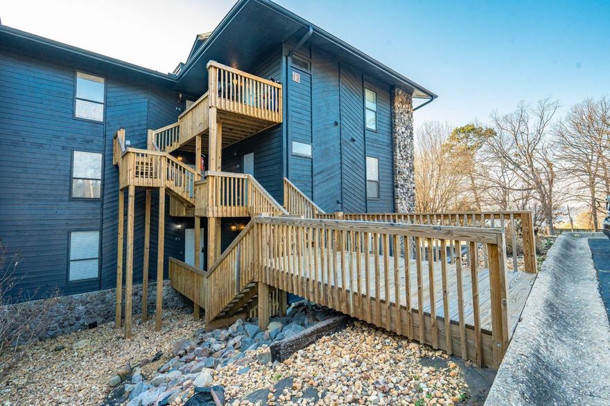 A corner unit set within the gated waterfront community of Hamilton Harbor, this updated condo offers a turnkey opportunity for effortless enjoyment or rental income. Thoughtfully refreshed in a calming neutral palette, the interior features vinyl plank flooring throughout, high-style stone countertops, stainless steel appliances, and custom tile showers, creating a clean, inviting aesthetic. The living area and primary suite flow seamlessly to a newly built deck overlooking the pool, where views of Lake Hamilton and glowing sunset skies provide a beautiful backdrop, morning through evening. Offered furnished with the HVAC unit and water heater less than 3 years old, this condo is ready to enjoy as a full-time residence, weekend retreat, or investment property. Hamilton Harbor owners and guests enjoy a gated entry, an in-ground pool, pickleball and basketball courts, and shared waterfront common areas ideal for relaxing by the lake. This is a rare opportunity to own an updated, furnished Lake Hamilton condo for $220,000. [Appliances, furnishings, and contents convey, excluding select decorations and textiles belonging to the listing agent. List available upon request.]