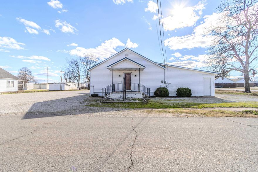 Church Property for Sale – 304 E Vine St, Paragould, AR Welcome to 304 E Vine Street, a well-maintained and functional church property offering a versatile layout ideal for congregational use, ministry expansion, or adaptive reuse. This property features a nice-sized sanctuary with seating capacity for a growing congregation, complete with a dedicated sound room for audio/visual control and live services. The building includes a children’s church area with colorful, engaging space designed for youth ministry, along with multiple Sunday school classrooms suitable for small groups, Bible study, or educational programs. A full kitchen provides excellent functionality for fellowship meals, events, and community outreach. Additional highlights include office space for pastors or administrative staff, storage areas, and thoughtful interior flow between worship, education, and fellowship spaces. The exterior offers a gravel parking lot with ample parking and easy access for members and guests. This property presents a turnkey opportunity for a church congregation, ministry organization, nonprofit, or even potential conversion to a community center, event space, or meeting facility.