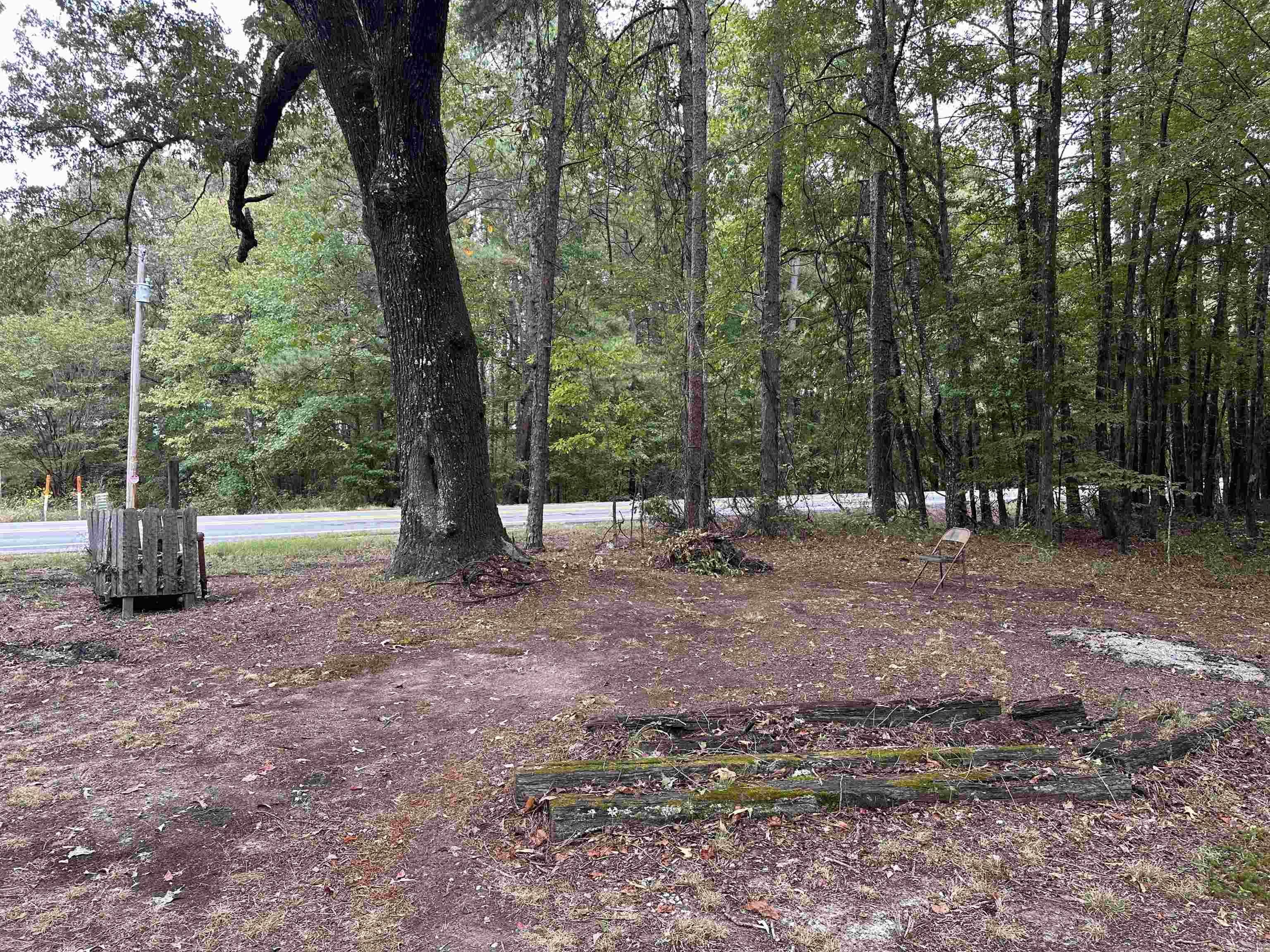 HERE'S YOUR PRIME OPPORTUNITY TO OWN 8 ACRES WITH EXCELLENT HIGHWAY FRONTAGE, OFFERING HIGH VISIBILITY AND EASY ACCESS. THIS PROPERTY IS UNRESTRICTED BY SUBDIVISION RULES OR HOA, WHICH GIVES YOU THE FREEDOM TO DO YOUR OWN THING!! THERE ARE UTILITIES ON SITE. NOTE: THERE IS A MOBILE HOME WITH NO VALUE LOCATED ON THE PROPERTY. NO SELLERS DISCLOSURE