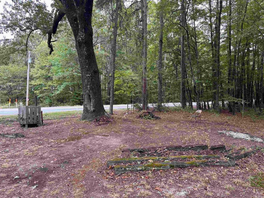 HERE'S YOUR PRIME OPPORTUNITY TO OWN 8 ACRES WITH EXCELLENT HIGHWAY FRONTAGE, OFFERING HIGH VISIBILITY AND EASY ACCESS.  THIS PROPERTY IS UNRESTRICTED BY SUBDIVISION RULES OR HOA, WHICH GIVES YOU THE FREEDOM TO DO YOUR OWN THING!!  THERE ARE UTILITIES ON SITE.  NOTE:  THERE IS A MOBILE HOME WITH NO VALUE LOCATED ON THE PROPERTY.  NO SELLERS DISCLOSURE
