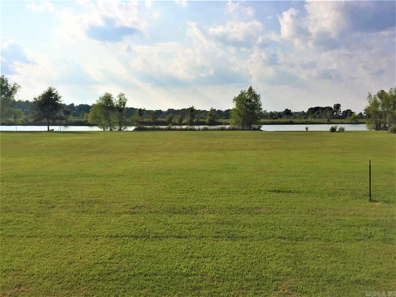 Come on out, and get a glimpse of what Lake front living from the back porch is like. Fish from your own backyard. Lots big enough for the avid gardener. Who doesn’t love from lake-to-table, from garden-to-table. Mound Lake Estates is a true hidden gem gated community, where everyone waves. An out of city limits feel but still a close commute to necessities. Restaurants, shopping, and grocery can easily be a 20-25 minute commute to North Little Rock, and about 15 minutes to England. Little Rock AFB about a 25 minute commute. Major distribution centers such as Lowes, Dollar General, Amazon, and Caterpillar Inc. about a 20 minute commute. These Lots are level with gas, water, and electric available. Community sewer available or septic, you get to make the choice. Bring your Builder and house plans. Architectural committee to approve house plans. The larger lake “Mound Lake” is accessed by a 150 foot boat ramp for more adventurous fishing or just boating to relax and unwind. Please see Agent Remarks.