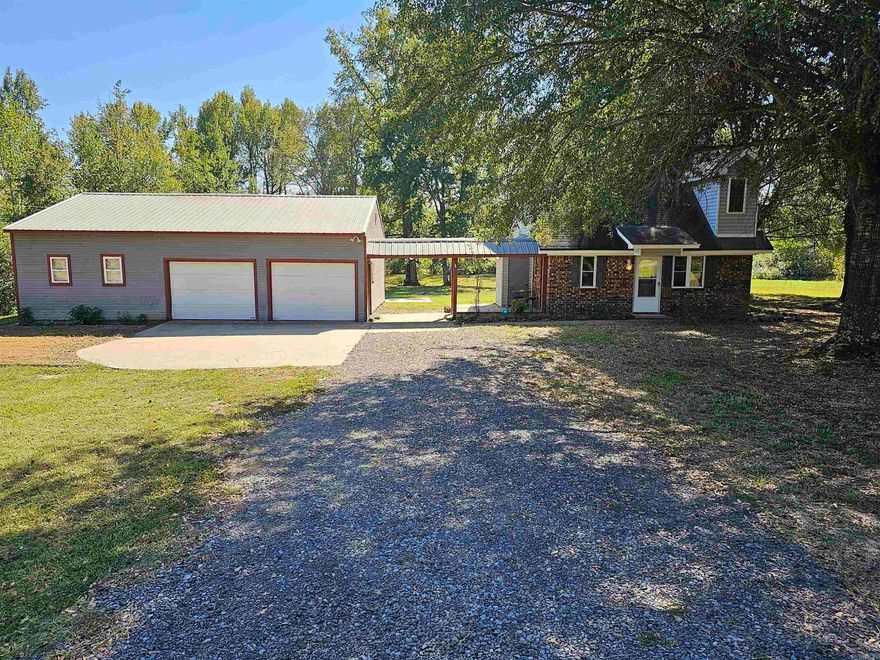 Come check out this Home with a 30x40 detached garage and shop. This 2-story home is sitting on approximately 1.5 acres. The home has laminate floors in the living area and primary bedroom. The home has wood ceilings and wood accents throughout. The beautiful lot with a storm shelter sits just on the edge of town.