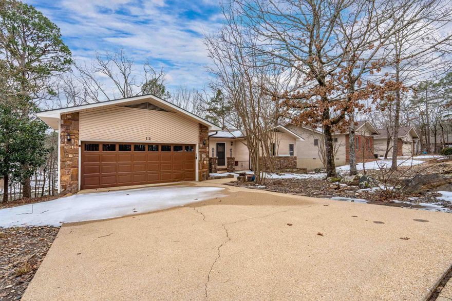 Experience true waterfront living with this beautifully remodeled lakefront home on Lake Pineda. Positioned to capture sweeping water views, this 3-bedroom, 3-bath property offers the ideal balance of comfort, functionality, and lifestyle.  Inside, the open living and dining area centers around a cozy fireplace and flows effortlessly into a sunroom designed to showcase the lake. The updated kitchen features new appliances, refreshed finishes, and durable LVP flooring that runs throughout the home, creating a clean, cohesive feel. All bathrooms have been thoughtfully updated.  The oversized laundry room includes a utility sink and abundant storage. A dedicated workshop, separate craft room, and additional storage space provide flexibility for hobbies, lake gear, or future customization.  Outdoors, the expansive deck invites grilling, entertaining, or quiet evenings overlooking the water.  Located just minutes from Village amenities, recreation, and everyday conveniences, this home offers both serenity and accessibility. Lakefront opportunities like this on Lake Pineda are limited.   Schedule your private showing and experience the lifestyle.