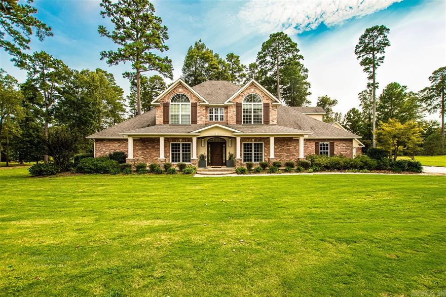 Dreaming of lush tree lines and golf course living? Look no further! This 3,620 square foot home is nestled on a 3/4 acre lot in the highly sought after neighborhood of Mystic Creek. Four large bedrooms and 2.5 half bathrooms give you plenty of room to enjoy alone time or quiet mornings and evenings together. The master bath boasts spa-like amenities with a large walk-in shower and jetted tub. Not to mention his and hers closets - say hello to organization! Don't forget to check out the custom home theatre room with a wet bar, formal dining room and spacious playroom/loft above the 3rd garage - the perfect spaces for family nights in or entertaining in the easy-to-navigate kitchen. After casual dinner or entertaining, you can sweep up the mess easily with the central vaccuum system too! Speaking of entertaining - have your friends over for to enjoy the outdoor kitchen and fire pit that look over the 8th Hole on the Mystic Creek Golf Course - named the Number 1 Best Course You Can Play in Arkansas! Never worry about the lights going out on this fabulous home - a built-in generator gives you peace of mind during the beautiful Arkansas rains. If you're looking for it all, look no furt