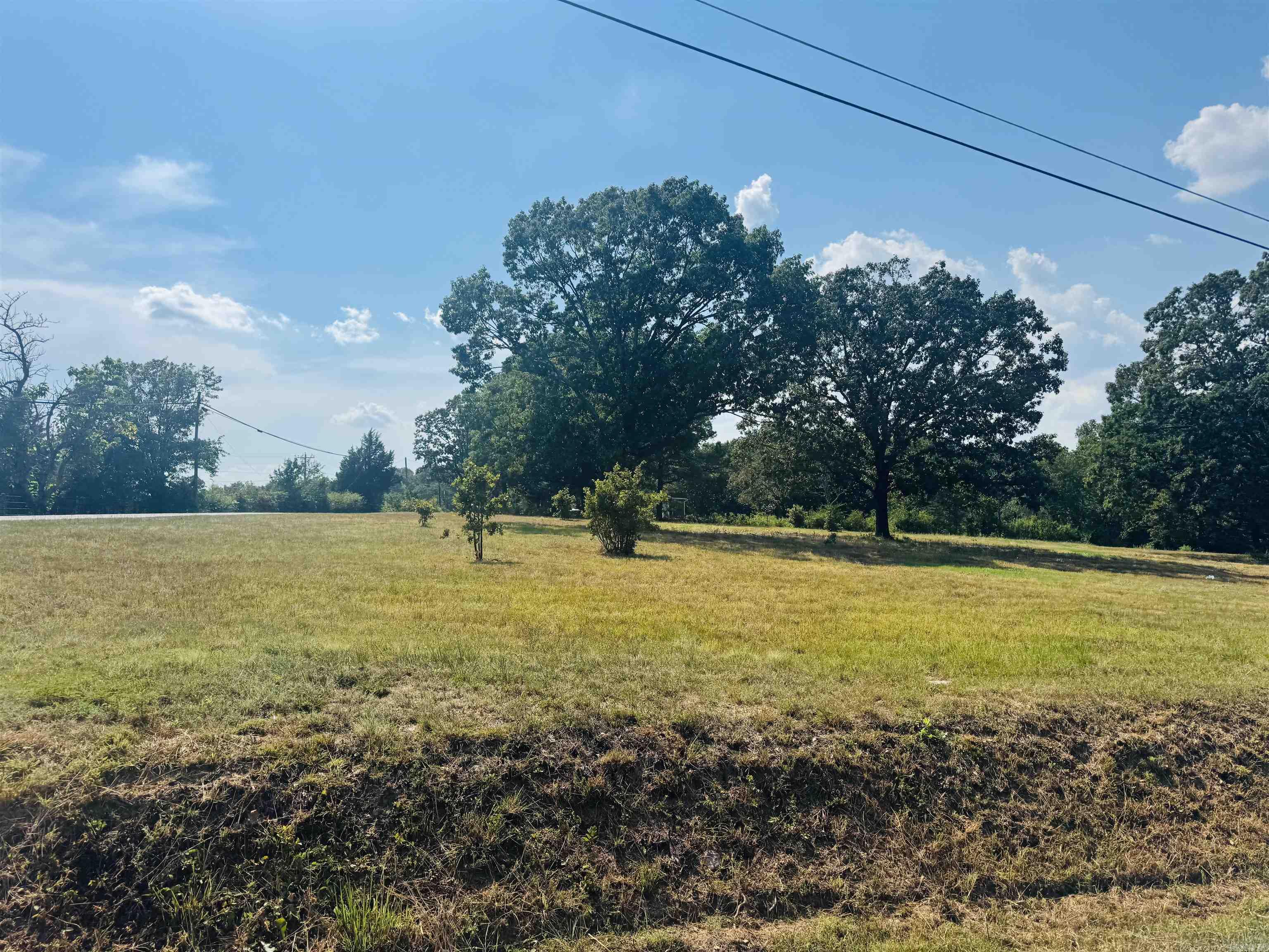 Looking for some land to build that dream home? This corner lot is ready for your blueprints!! With over an acre of ground, and its large oak trees, this would make a wonderful home place. Located less than 5 miles from the freeway and everything Cabot has to offer. Driveway is in place as well as water meter and outside faucet. Recent survey and perc test is on file. No restrictions in this area so possibilities are endless. Very nice cleared lot with mature oak trees ready for a new owner, so drive by and see it for yourself!