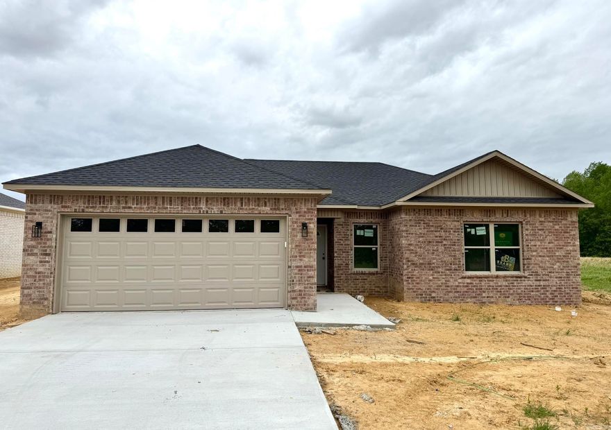 Move-in ready new construction in Beebe offering 3 bedrooms, 2 bathrooms, and 1,250 sqft of thoughtfully designed living space. This all-brick home features a modern open-concept layout with quartz countertops, stylish finishes, and a seamless flow between the kitchen and living area—perfect for everyday living and entertaining.  Built with spray foam insulation for enhanced energy efficiency and lower utility costs, this home combines comfort with long-term savings. The full brick exterior provides durability and timeless curb appeal, while the included privacy fence adds both convenience and functionality.  Enjoy low-maintenance, quality craftsmanship throughout in a home designed for real life—don’t miss this opportunity in Beebe!