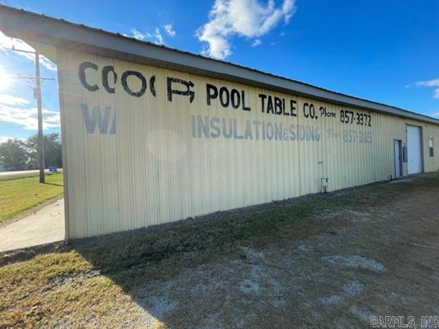 Zone residential, but could possibly be rezoned to commercial. 2000 sq ft living area with 2000 sq ft workshop area