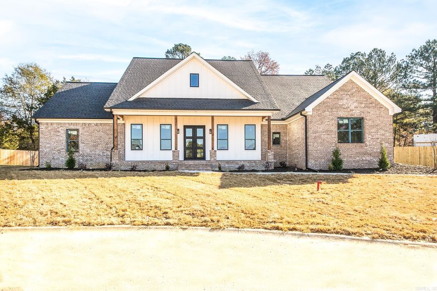 Go check out this amazing home! It is conveniently located near local shopping, schools & city amenities. This 5 bed/2.5 bath with one of the bedroom/ bonus room being upstairs welcomes you with beautiful front doors. The kitchen includes an island, HUGE double fridge, Gas stove, granite counter tops, lots of cabinets, stainless steel appliances and a walk in pantry to die for! All bedrooms are spacious. Master bath includes tiled shower, double vanities, huge closet! Giant laundry room with storage space! Covered back patio and fence included as well and a 3 car garage! Call today!  ** Pictures are from the same floor plan to show fixtures and finishes.