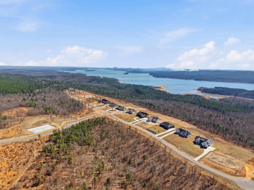 Nestled inside the prestigious gated community of Lakeview West, this exceptional nearly 2-acre homesite offers some of the most breathtaking views in Central Arkansas. Overlooking the lake, the western mountain range, and iconic Pinnacle Mountain State Park, this property delivers an unmatched setting for your future dream home. Enjoy expansive panoramic vistas, stunning sunsets, and incredible privacy as the lot backs to immense protected green space with no rear neighbors.  Lakeview West has experienced tremendous demand, with all previously developed lots in the neighborhood already sold. This newly developed homesite presents a rare opportunity to secure one of the premier estate lots in the community. Combining elevation, unmatched views, privacy, and luxury gated living, this property offers a truly one-of-a-kind setting just minutes from the conveniences of West Little Rock