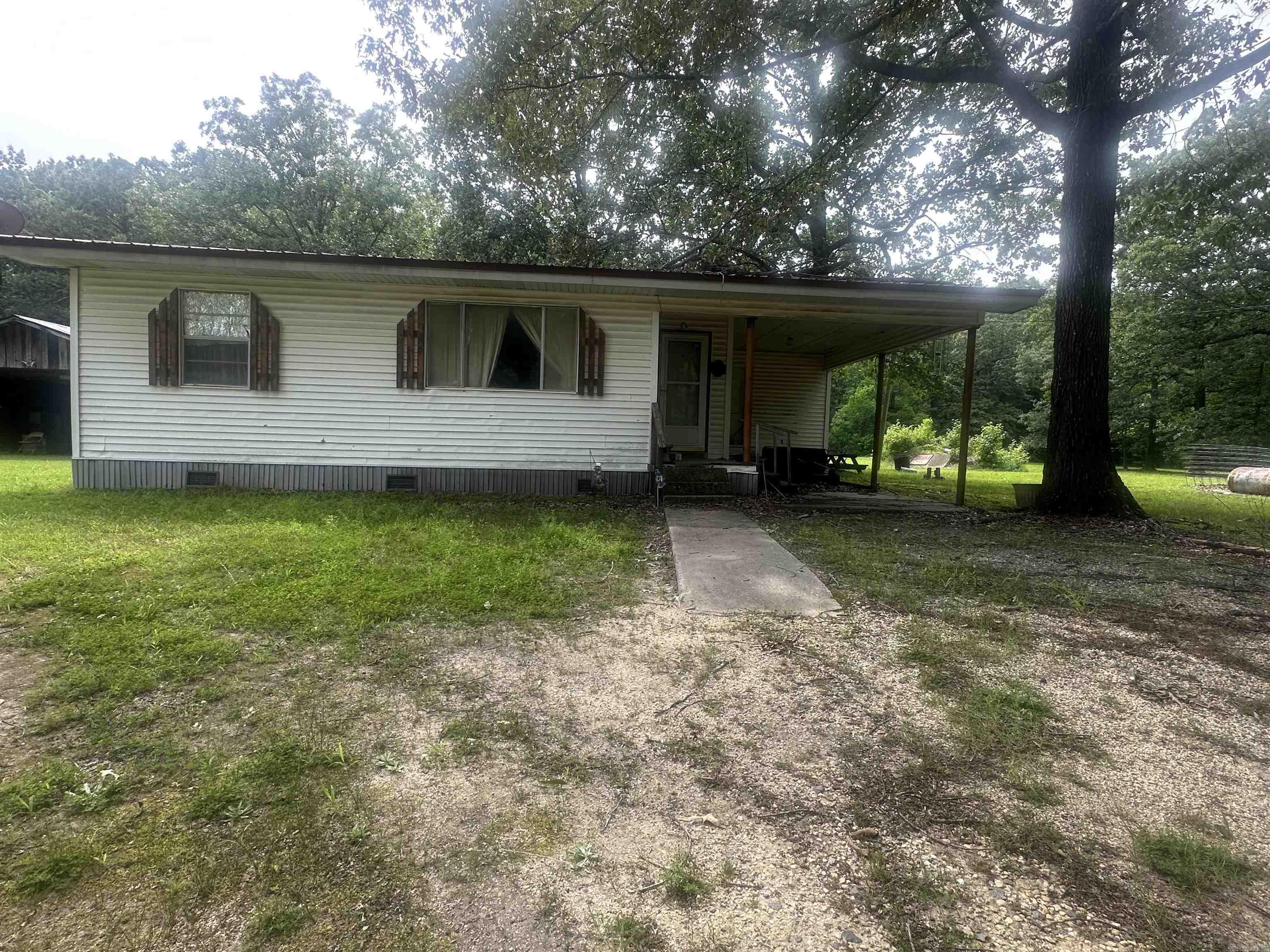 Investor Special! This charming ranch-style home sits on a spacious 2-acre lot, offering endless potential for the savvy investor. With a solid structure and a functional layout, this cozy home is a perfect flip opportunity or a fantastic candidate for a long-term rental. Enjoy peaceful country living with room to expand, garden, or build additional structures. Just bring your vision and a toolbelt—this one won't last long!