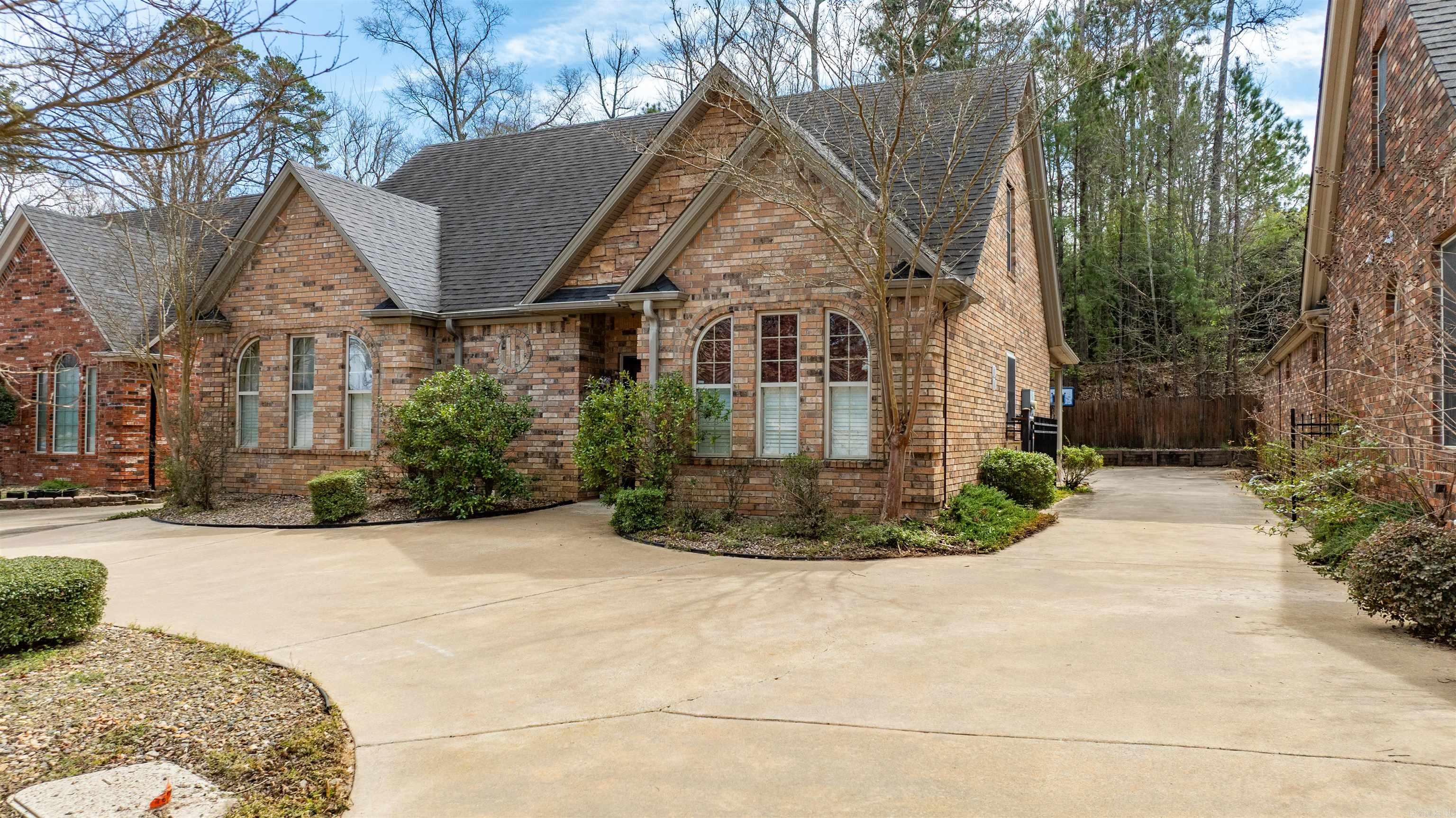 Welcome to this spacious home in the desirable Hurricane Lake Villa Estates! With 4 bedrooms and 3.5 bathrooms, this 2,758 sq ft home offers comfort and style. The inviting brick exterior features a circle drive and a private gate leading to a 2-car garage. Inside, enjoy beautiful soaring ceilings and hardwood flooring throughout the main level, including a formal dining and a large eat-in kitchen with a brand new GE smart dishwasher and ample cabinet space. The generous primary suite includes a walk-in closet and a private bath with a soaking jacuzzi tub. Upstairs, an additional living room with a wet bar and full bathroom provide multiple entertaining spaces. and a separate laundry room adds convenience. The large back covered patio is perfect for alfresco dining and outdoor relaxation. Located in a family-friendly neighborhood with a playground, picnic areas, pickleball courts, a splash pad and beautiful lake views, this a perfect place to call home!