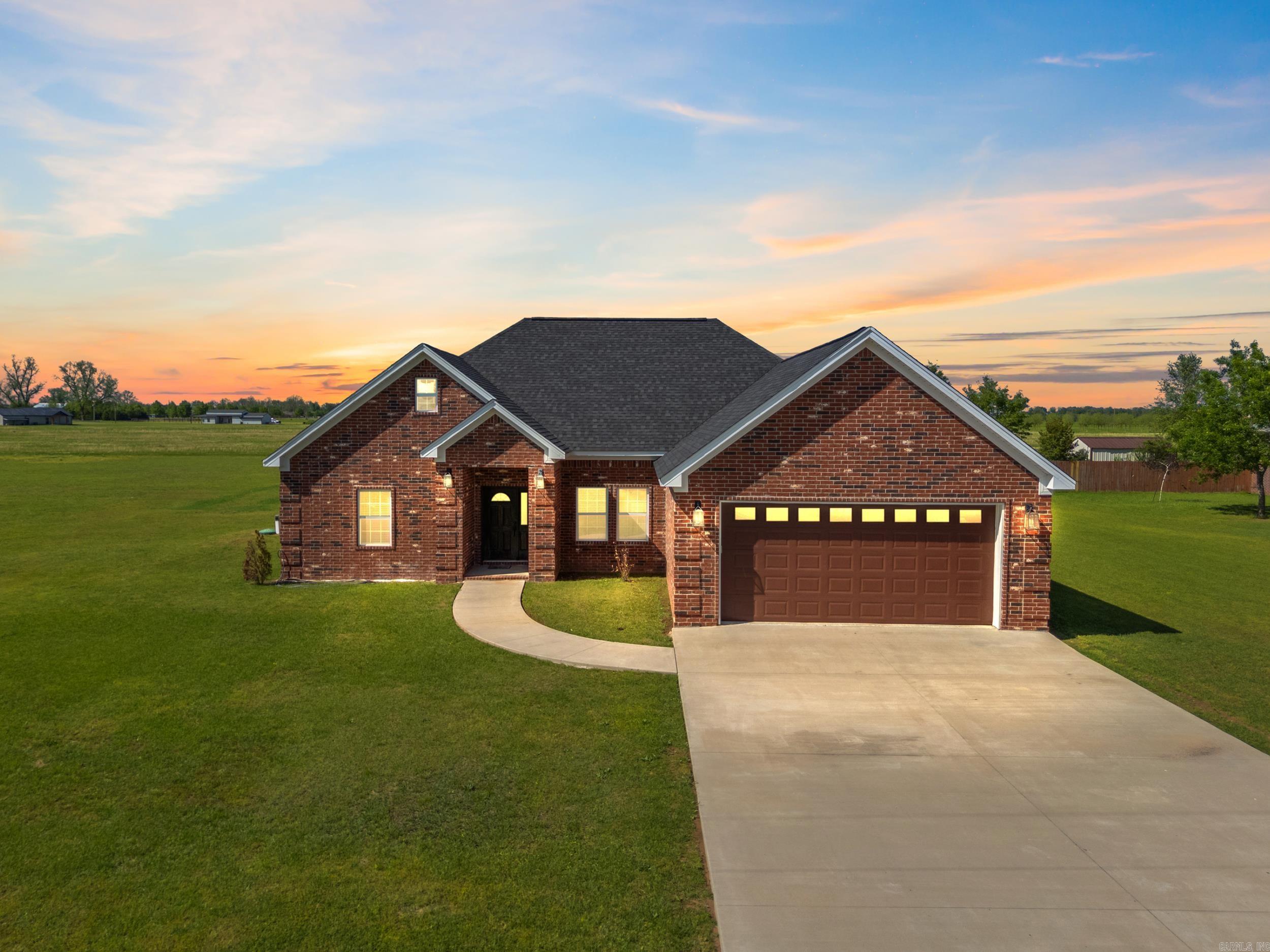 Welcome home! Experience the perfect blend of country charm and modern convenience with this stunning brick home situated on a peaceful 1.03-acre lot in picturesque England, Arkansasājust a short 23-minute drive from Little Rock. Surrounded by beautiful agricultural views and custom-built homes, this property offers a serene, upscale atmosphere with no mobile homes nearby and expansive acreage all around! Inside, you'll find soaring 10+ ft ceilings in every room, spacious walk-in closets in all bedrooms, and exquisite quartz countertops throughoutāincluding the laundry room. The home is equipped with a high-efficiency commercial-grade in-ground septic system, reliable HVAC, and is connected to a community water system for added convenience. Luxurious bathrooms feature dual overhead and frontal waterfall showerheads, and the home includes abundant storage space thoughtfully placed throughout. This exceptional property is attractively priced and ready for its next ownerāschedule your showing today!