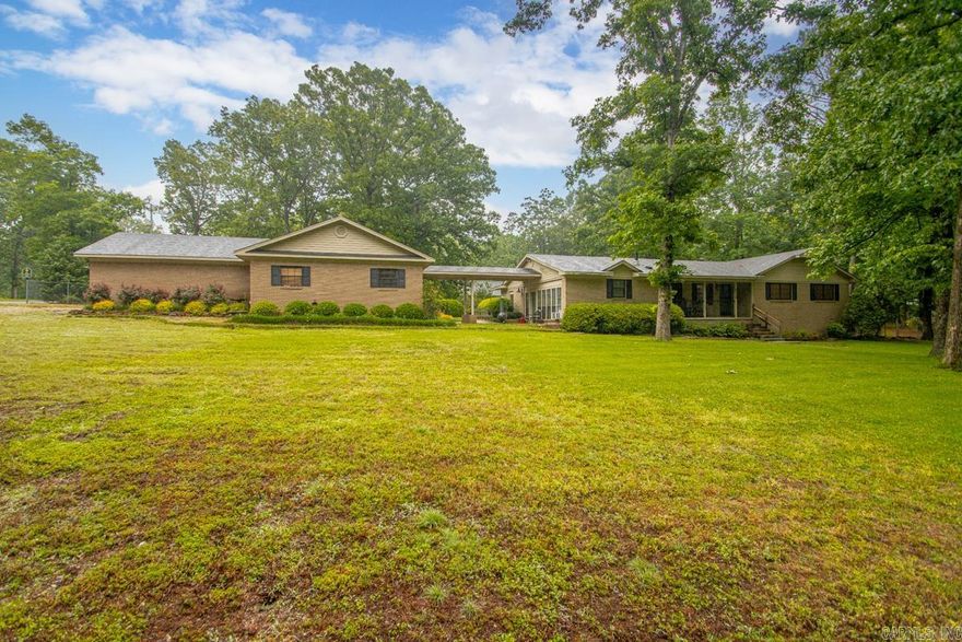What does this property not have!? Main home, guest home, shop, pool, over 2 acres, and just seconds from the interstate and everything Bryant and Benton have to offer. Country living in town at its finest! The main home features approximately 2,300 sqft with 3 bedrooms, 2.5 baths, and a spacious primary suite complete with a walk-in shower and soaking tub. The guest home offers approximately 800 sqft and includes a full kitchen along with multiple rooms that could serve as offices, business space, guest quarters, or an in-law suite. The garage is attached to the guest home with a breezeway connecting it to the main house. And we haven’t even talked about the property itself! Sitting on a massive 2+ acre corner lot, this property offers multiple entrances, plenty of fenced space, and endless possibilities. The backyard is built for entertaining with a huge in-ground pool ready for summer fun. Need space for hobbies or work? The 40x16 shop has you covered. There are also multiple covered parking areas perfect for boats, trailers, or extra vehicles. The yard is ready for your imagination. Opportunities like this do not come often — come make this special property yours for years
