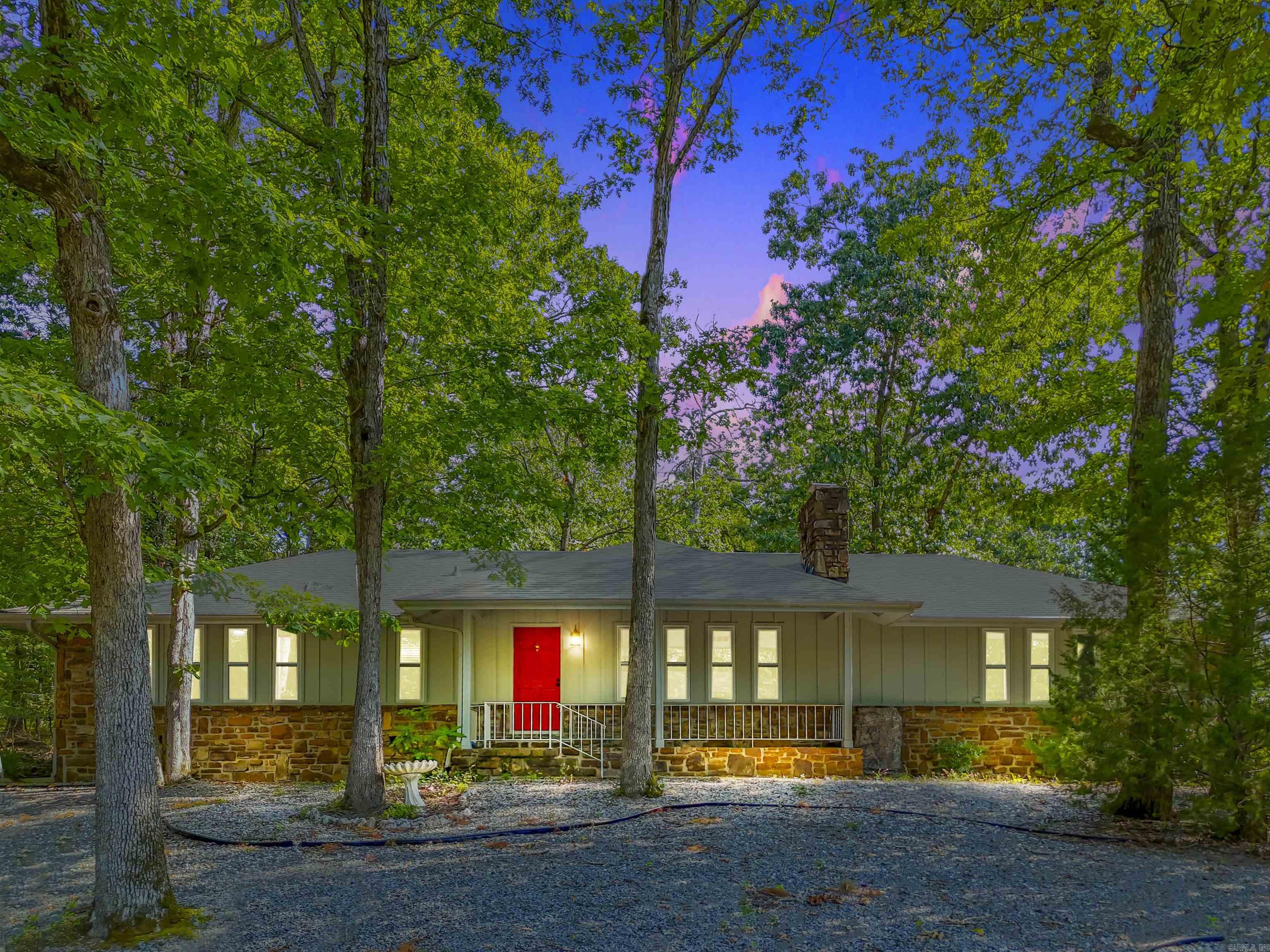 Welcome to this charming, updated one-level home just moments from DeSoto Lake! Step inside to an inviting open-concept layout, perfect for easy living and entertaining. The bright sunroom with vaulted ceilings offers a serene view of the spacious, fenced backyard and flagstone patio—ideal for outdoor relaxation. Recent updates, including new windows, flooring, fresh paint, and renovated bathrooms, ensure this home feels like new. Need extra space? The large storage building with a loft provides plenty of room for all your storage needs. This home is full of warmth and potential—schedule your private tour today and see all it has to offer! ***Agents see remarks***