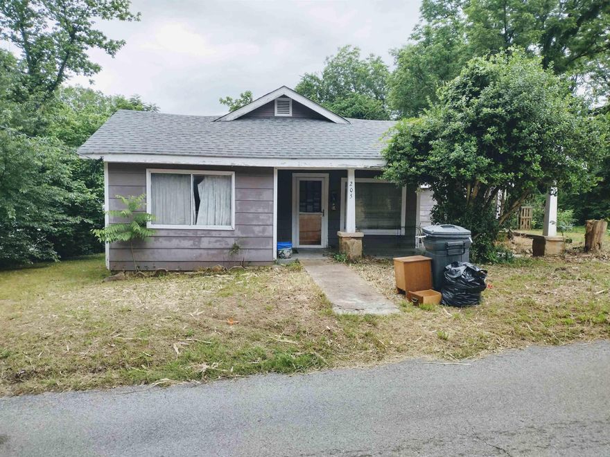 Location Location Location !!! Investment opportunity awaits with this 1822 sqft house conveniently located near Mountain View court square, boasting .54 acres M/L opportunities abound, albeit requiring renovations.