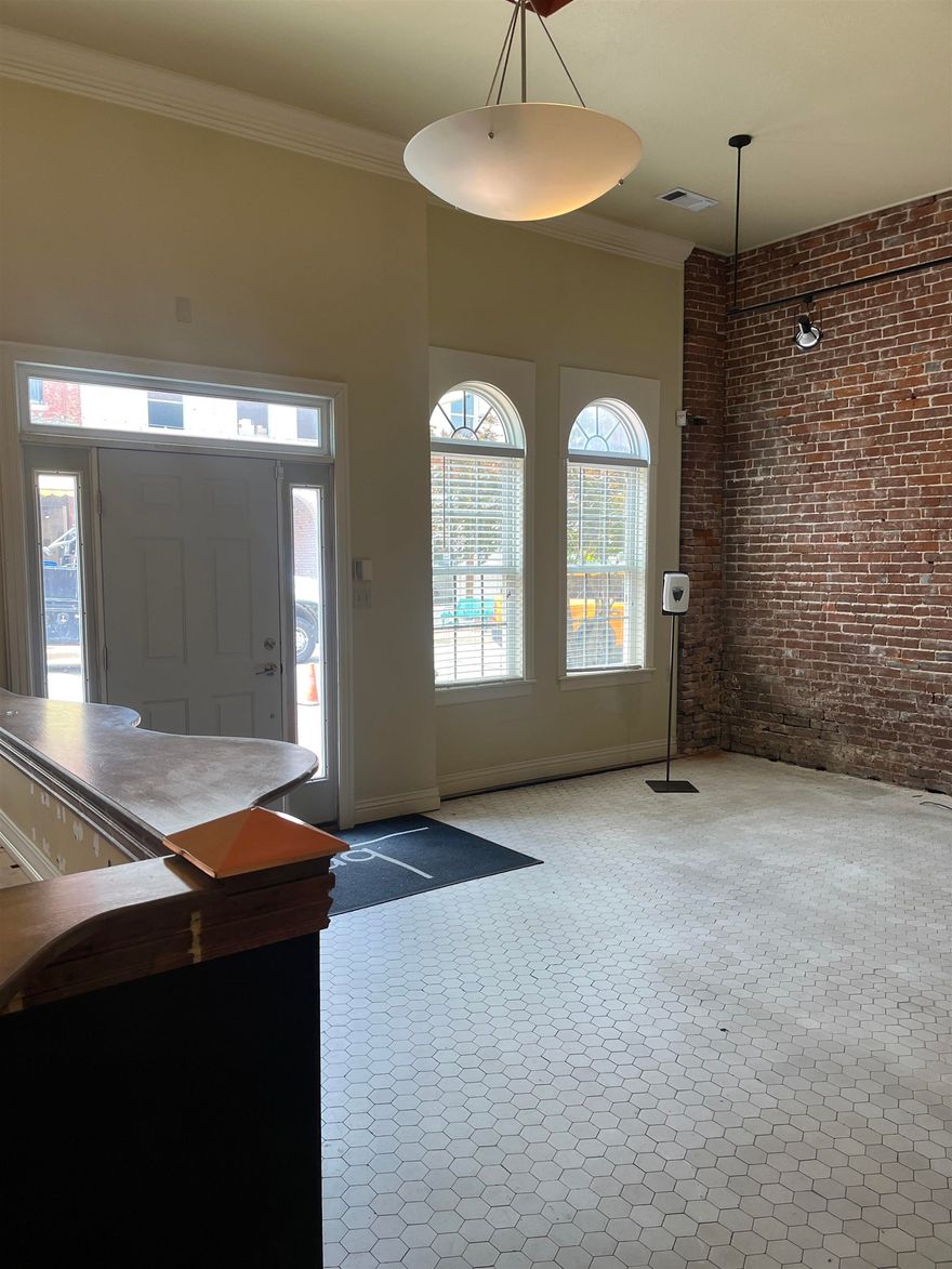 Located in the heart of downtown Jonesboro, this 2,300 sq ft office building offers a cool, professional space perfect for a growing business. It features four private offices, a welcoming lobby, a breakroom, and three bathrooms—ideal for comfort and productivity. With great visibility and access to the energy of Main Street, it’s a solid spot to plant your business in a vibrant part of the city.