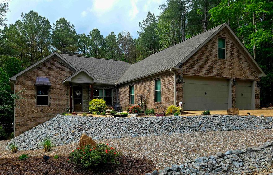 Experience the perfect blend of elegance in this custom-built McMillan home, ideally situated in a serene, park-like setting directly across from the prestigious Isabella Golf Course. The heart of the home is a magnificent, open living area anchored by a stunning fireplace and custom built-ins, creating a warm and sophisticated atmosphere.  Entertain with ease in the formal dining room or the bright eat-in kitchen featuring an expansive breakfast bar. The primary suite is a true retreat, boasting a modern walk-in shower and a generous walk-in closet, while two guest bedrooms are thoughtfully separated for maximum privacy.  The "hidden gem" is the spacious upstairs bonus level—a versatile sanctuary. Perfect for a 4th bedroom, craft room, or game room. Step outside to the wonderful, quiet deck to enjoy the surrounding nature. This quality-built retreat is a must-see for those seeking luxury and location! More Pics coming soon