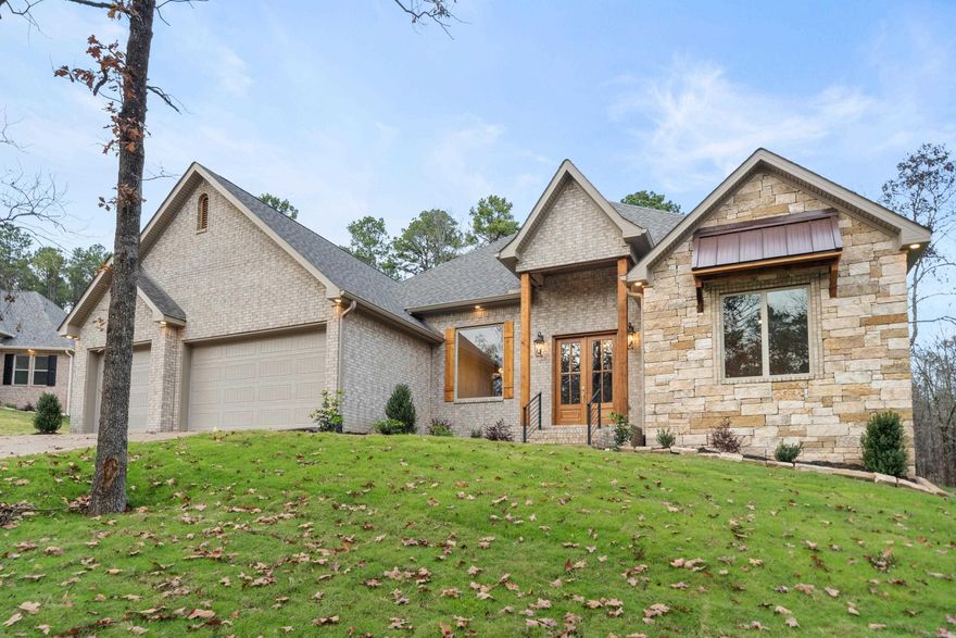 New Construction in  Highly Desired 7 South location.  Stunning Home with the appointments you are looking for. Beautiful wood beam ceilings  add charm to this open floorplan that welcomes your family and guests. Enjoy cozy holidays around the fireplace.  Large granite island in the chef’s kitchen, double ovens and  custom cabinets. The primary bedroom features walk in closet and ensuite with luxurious finishes. Stairs to attic for storage.   POA is currently being formed, no financial or dues amount have been established but developer had indicated it should be like Blue Herron POA. Estimated completion  November 2024. Deeded lake access. Lake Views , across the street from Lake Hamilton.