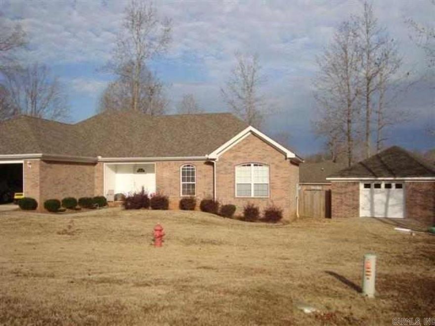 Great 4 bedroom, 2 bath with detached workshop on almost 1 acre.