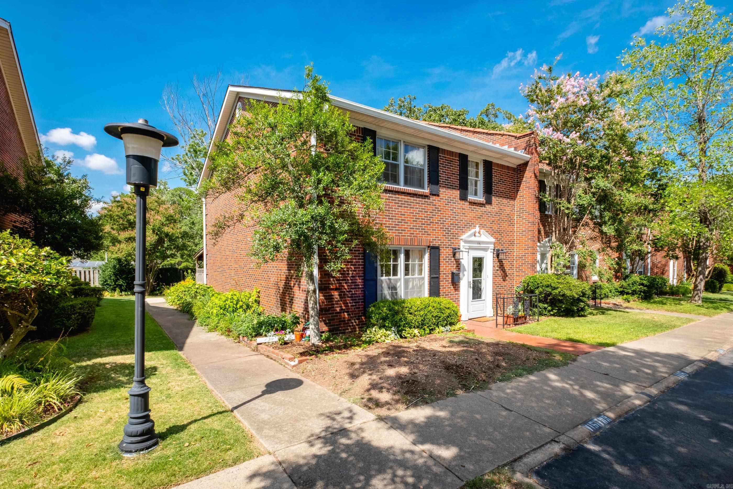 Beautiful, well-maintained end unit located in Cambridge Place! The kitchen features granite countertops and stainless steel appliances, complemented by beautiful wood floors throughout the main level. The spacious living room includes a cozy gas fireplace, and thereās also a separate formal living roomāideal as a home office or additional entertaining space. A convenient half bath is also located on the main floor. Upstairs offers two bedrooms, including a generous primary suite with a walk-in closet and a walk-in shower. Enjoy your private covered patio, fully fenced for added privacy and ideal for petsāperfect for relaxing or entertaining. Take advantage of the fantastic community amenities, including a pool, tennis courts, basketball court, and clubhouse. POA fees cover water, trash, exterior maintenance, and full access to all amenities. Agents please see remarks.