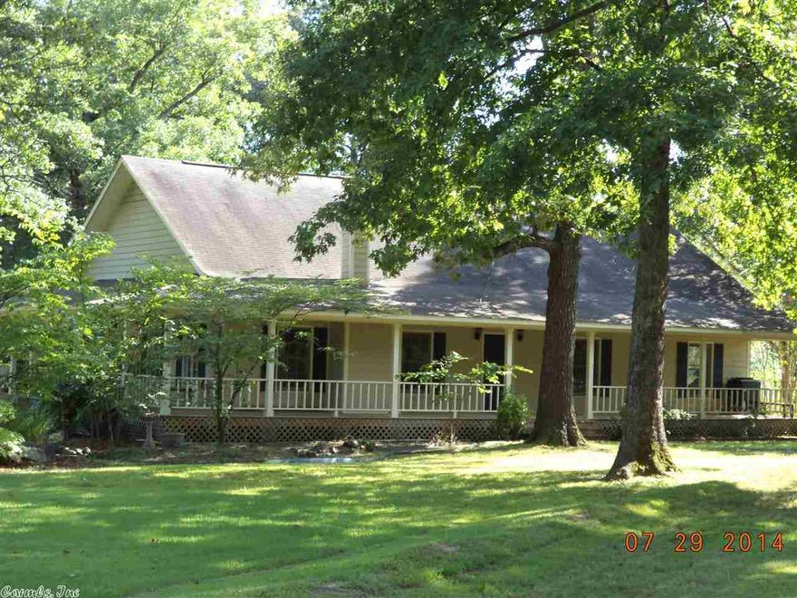 Beautiful County Home (2223 SF) with Separate In-Laws Quarters (576 SF) on 5 Acres. Fenced & Cross Fenced with 2-Stall Barn, Tack Room and Shop. Pond. Home Warranty for 1 year to Buyer. Single Level House. Private and set back from Barrett Road. Asphalt Driveway. Open Kitchen and Den/Living area with Fireplace for entertaining family and friends. 8-ft wide covered porch that wraps all around house. Sidewalk bricks and Lamp-Posts from the original LR Train Station.