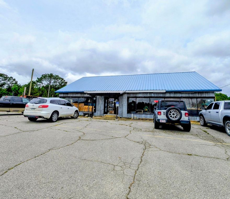 Prime commercial opportunity in the heart of Mena's growing business corridor! Positioned at the high-visibility corner of Hwy 71 and Reeves St, directly across from the new Casey's this approximately 6,000 sq. ft. building offers exceptional exposure and unlimited potential for investors, entrepreneurs, or expanding businesses. As Mena continues to grow with increasing tourism, outdoor recreation, and the highly anticipated bike trail development, this location is perfectly positioned to capitalize on the area's momentum. Ideal for a bike shop, brewery, warehouse, retail space, industrial use, service business, or redevelopment opportunity. High daily traffic count and signal-light exposure make this one of the most recognizable commercial corners in town. Whether you're looking to launch a new venture, expand your portfolio, or secure a strategic commercial location in Mena, this property delivers opportunity, visibility, and potential. Priced to sell and ready for its next chapter!